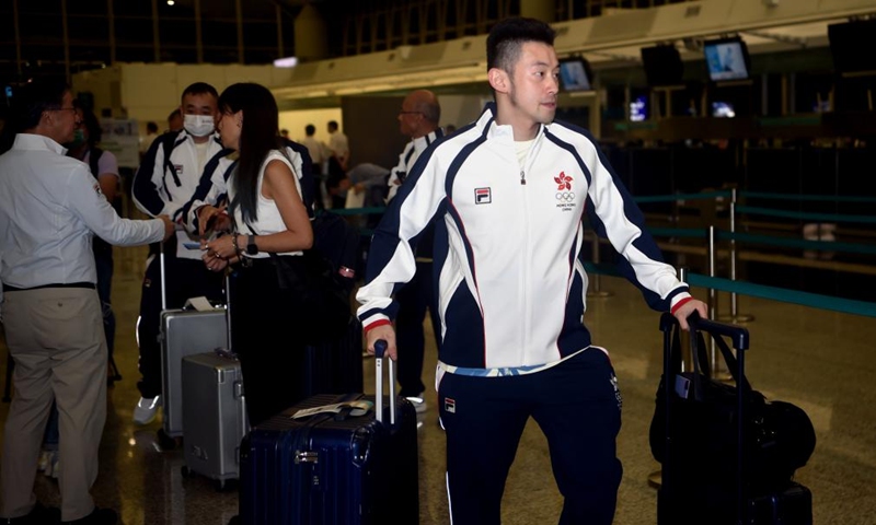 Athlete Wong Chun Ting of the delegation of China's Hong Kong is seen before the departure for Paris 2024 Olympic Games at the Hong Kong International Airport in Hong Kong, south China, July 22, 2024. (Xinhua/Lo Ping Fai)