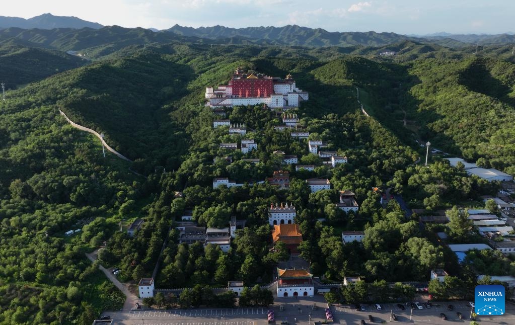 An aerial drone photo taken on July 20, 2024 shows a view of the Putuo Zongcheng Temple in Chengde City, north China's Hebei Province. Chengde, a popular summer tourism destination approximately 230 km north of the Chinese capital Beijing, is an important transportation hub in north China. The city with profound cultural heritage is a place where nomadic culture, farming culture, royal culture and folk culture blend together. (Photo: Xinhua)