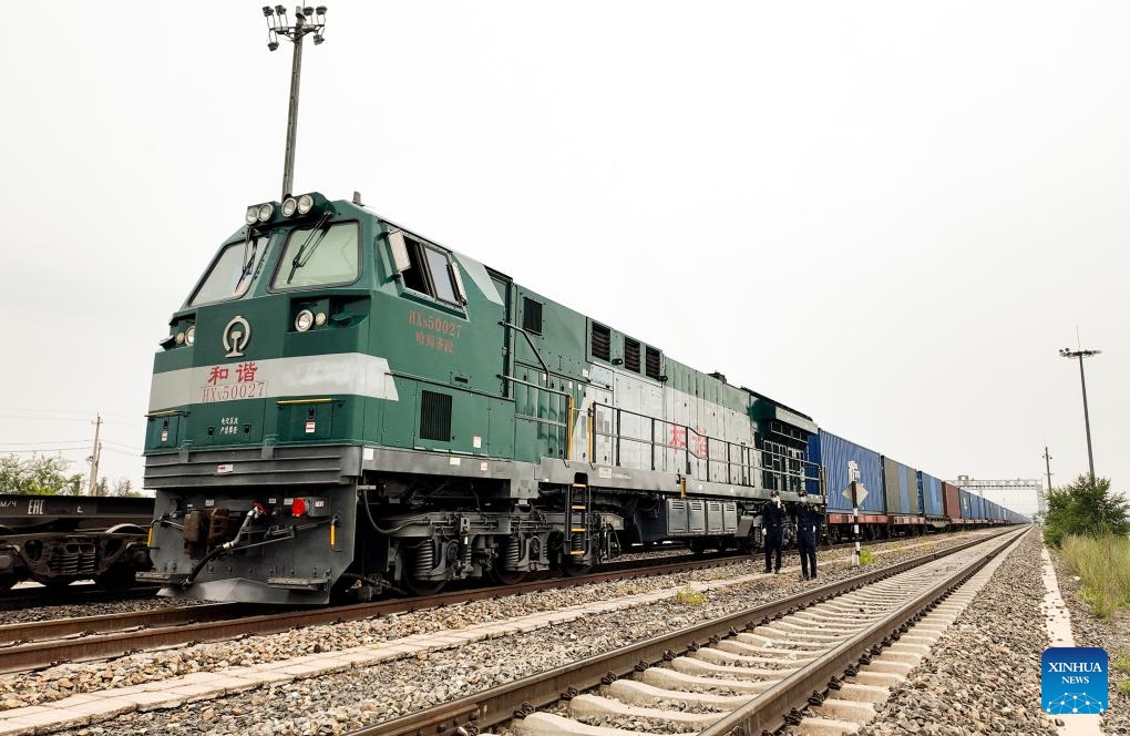 This photo taken on July 17, 2024 shows an outbound China-Europe freight train waiting to depart from the Manzhouli railway port in Manzhouli, north China's Inner Mongolia Autonomous Region. According to statistics from Manzhouli Customs, in the first six months of 2024, the Manzhouli railway port has handled 2,327 China-Europe freight train trips. (Photo: Xinhua)