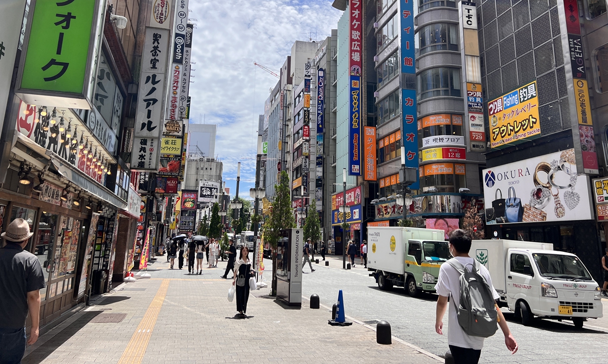 People walk on a street in Shinjuku, a buzzing district of Tokyo, Japan, on July 19, 2024. Photo: Leng Shumei/GT