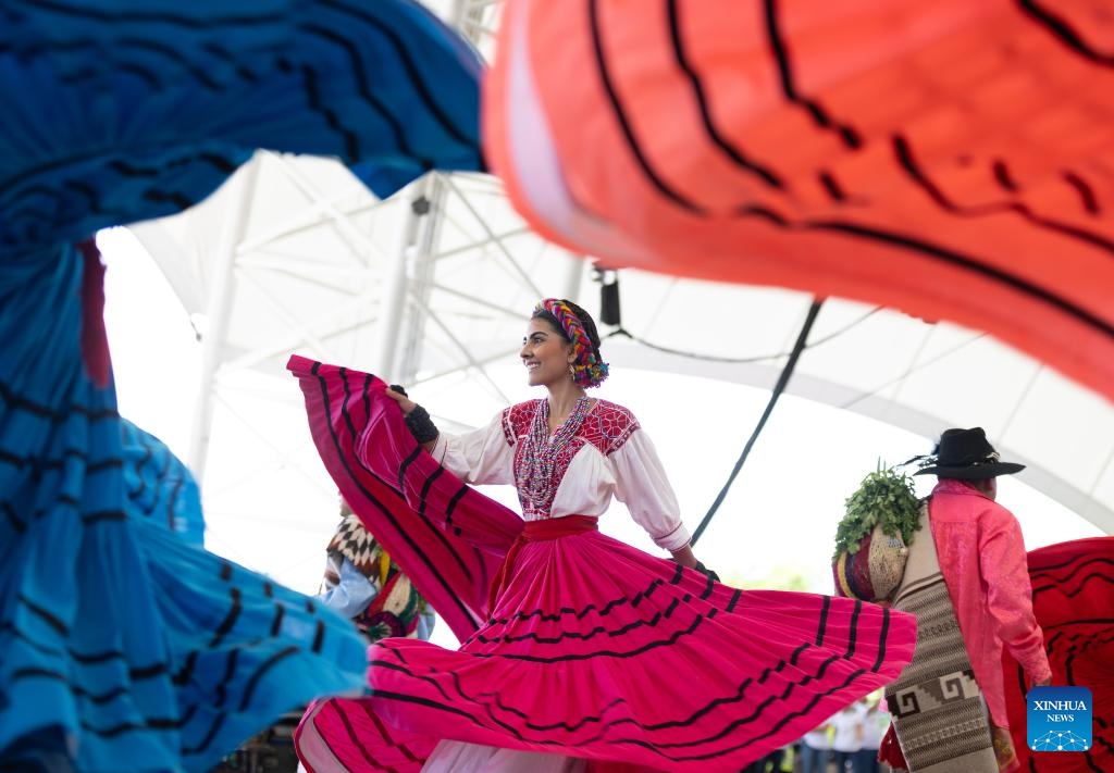 A performer dances at the Guelaguetza Auditorium in Oaxaca City, Mexico, July 22, 2024. Guelaguetza is an annual showcase of the indigenous cultures of Mexico, featured by traditional music, dance, and food. (Photo: Xinhua)