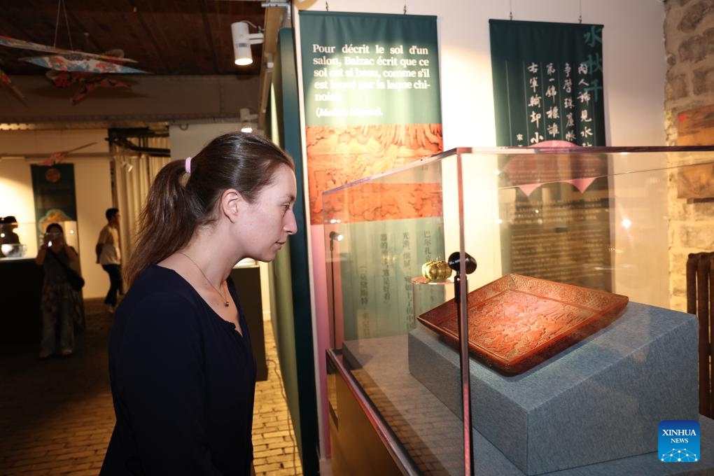 A visitor views an exhibit during the Vigor and Sportsmanship Chinese Sports Culture Exhibition ahead of the Paris 2024 Olympic Games in Paris, France, July 23, 2024. (Photo: Xinhua)