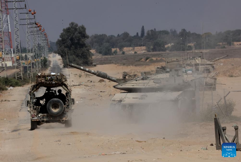 Israeli troops are seen near the border with Gaza Strip, in southern Israel, on July 24, 2024. Palestine on Wednesday urged the U.S. administration and Congress to pressure Israeli Prime Minister Benjamin Netanyahu to stop the ongoing conflict in the Gaza Strip, reported the Palestinian official news agency WAFA. (Photo: Xinhua)