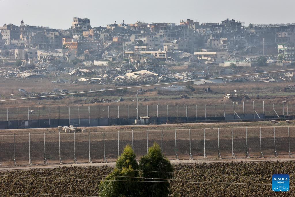 Photo taken on July 24, 2024 shows destroyed buildings in the Gaza Strip, as seen from Israel's southern border with the Gaza Strip. Palestine on Wednesday urged the U.S. administration and Congress to pressure Israeli Prime Minister Benjamin Netanyahu to stop the ongoing conflict in the Gaza Strip, reported the Palestinian official news agency WAFA. (Photo: Xinhua)