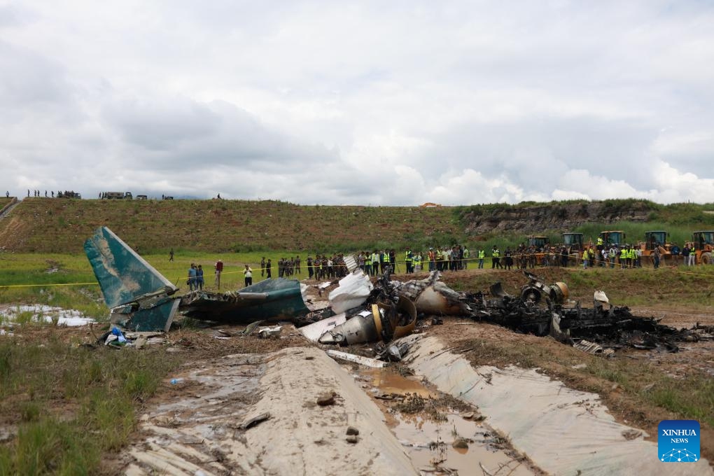 This photo taken on July 24, 2024 shows the site of an air crash at the Tribhuvan International Airport in Kathmandu, Nepal. Eighteen dead bodies have been recovered after a plane crashed on Wednesday at the Tribhuvan International Airport in Kathmandu, Nepal's capital, said Hansa Raj Pandey, spokesman at the Civil Aviation Authority of Nepal (CAAN). (Photo: Xinhua)