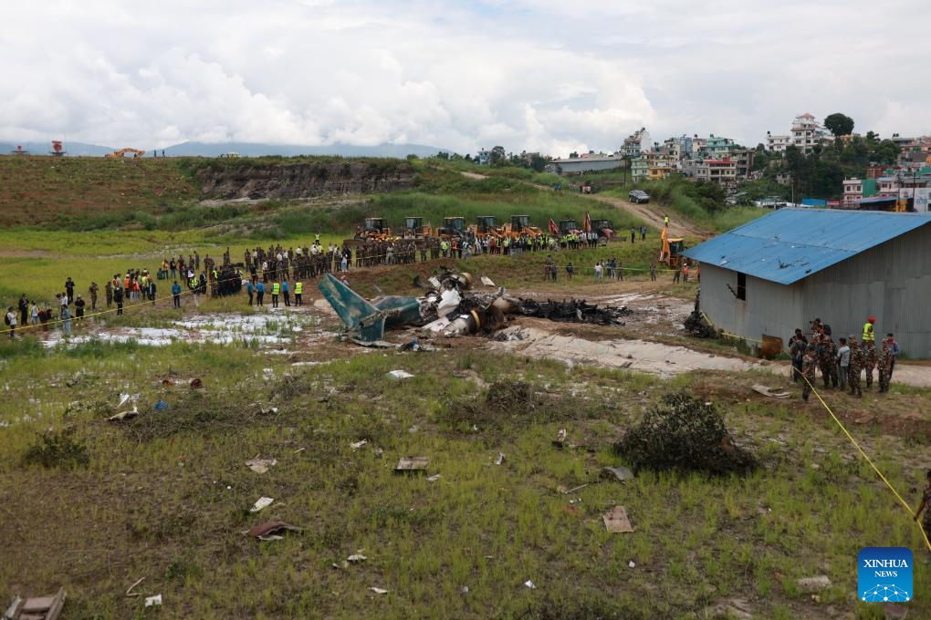 This photo taken on July 24, 2024 shows the site of an air crash at the Tribhuvan International Airport in Kathmandu, Nepal. Eighteen dead bodies have been recovered after a plane crashed on Wednesday at the Tribhuvan International Airport in Kathmandu, Nepal's capital, said Hansa Raj Pandey, spokesman at the Civil Aviation Authority of Nepal (CAAN). (Photo: Xinhua)