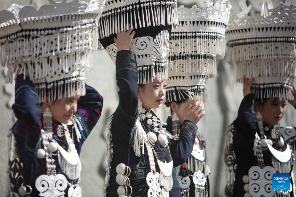 Local people dressed in traditional Yi costumes are seen in Butuo County of Liangshan Yi Autonomous Prefecture, southwest China's Sichuan Province, July 22, 2024. Residents in traditional costumes of Yi ethnic group participated in the four-day torch festival staged from July 21 to 24 (Photo: Xinhua)