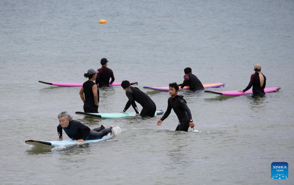 Tourists have fun on the beach in Donghae city, Gangwon province, South Korea, July 24, 2024. (Photo: Xinhua)