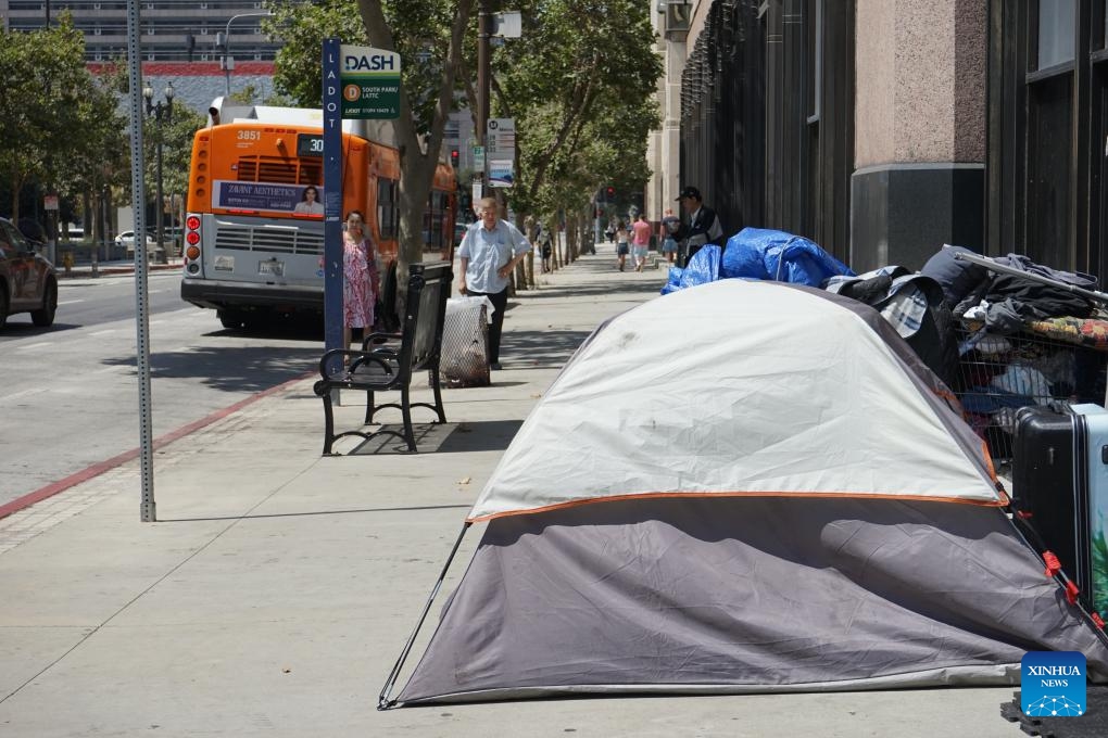 Tents of homeless people are seen in downtown Los Angeles, California, the United States, on July 25, 2024. California governor Gavin Newsom issued an executive order on Thursday directing officials in the most populated U.S. state to urgently address homeless encampments. (Photo: Xinhua)