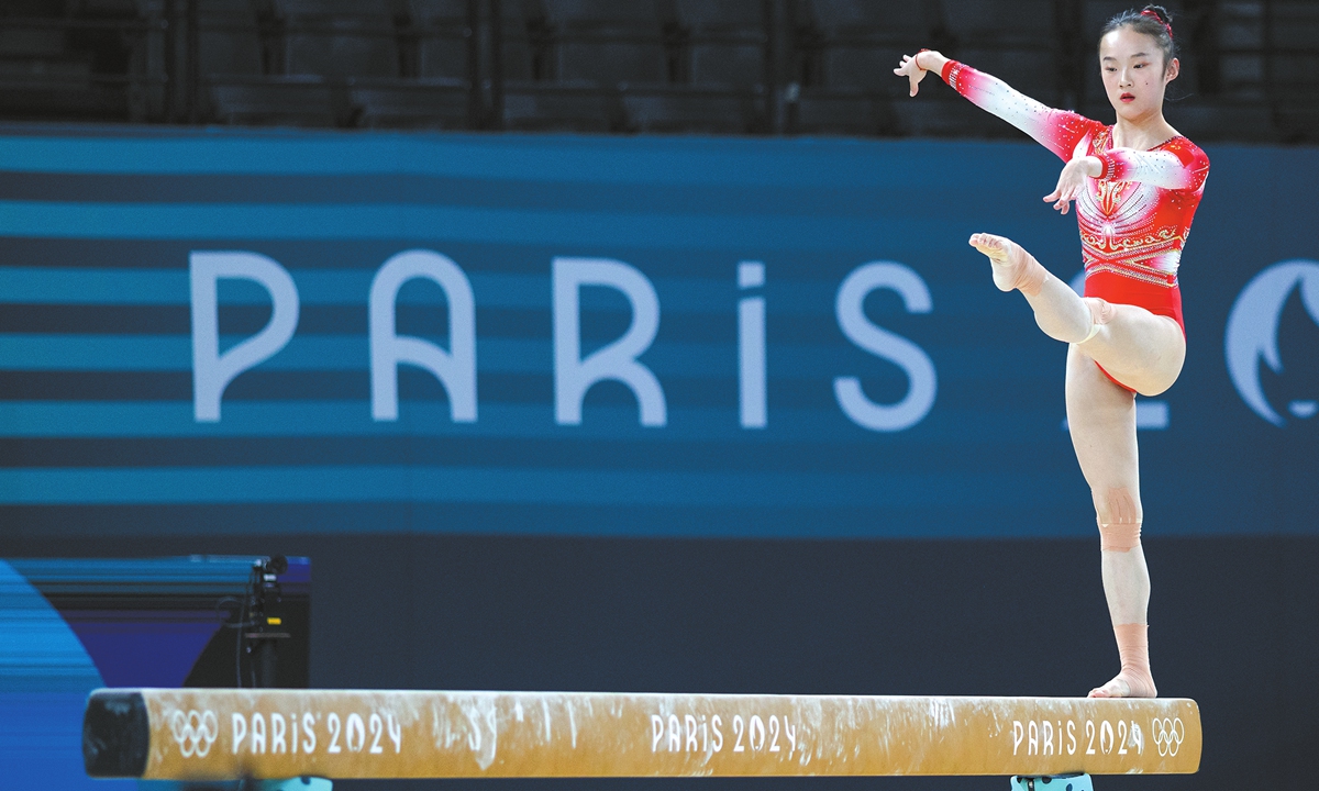 Zhou Yaqin performs her balance beam routine during Artistic Gymnastics training on July 25, 2024 in Paris.  Photo: VCG