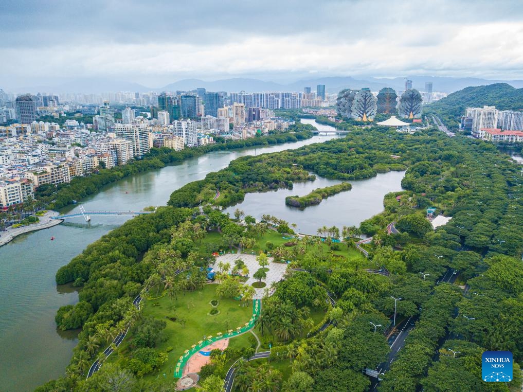 An aerial drone photo taken on July 22, 2024 shows the scenery of Bailu park and Linchun river in Sanya, south China's Hainan Province. Sanya, a popular tourist spot in the southern island province of Hainan, boasts excellent natural beauty. (Photo: Xinhua)