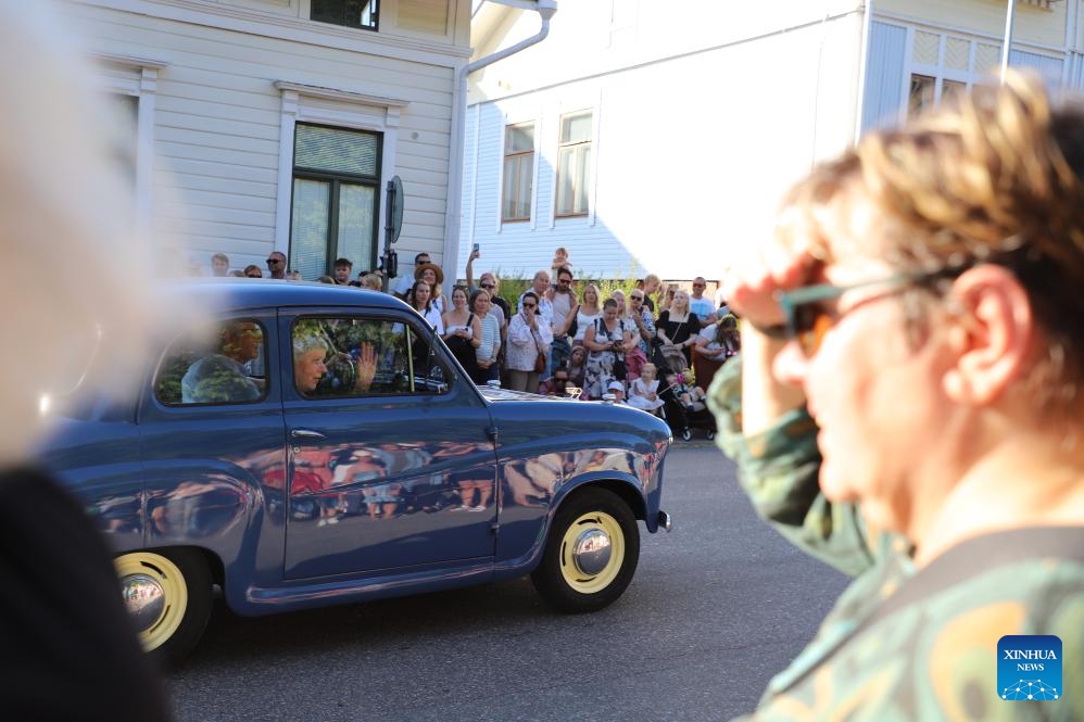 A vintage car is pictured during the Maritime Festival parade in Kotka, Finland, July 24, 2024. The four-day festival kicked off here on Wednesday. (Photo: Xinhua)