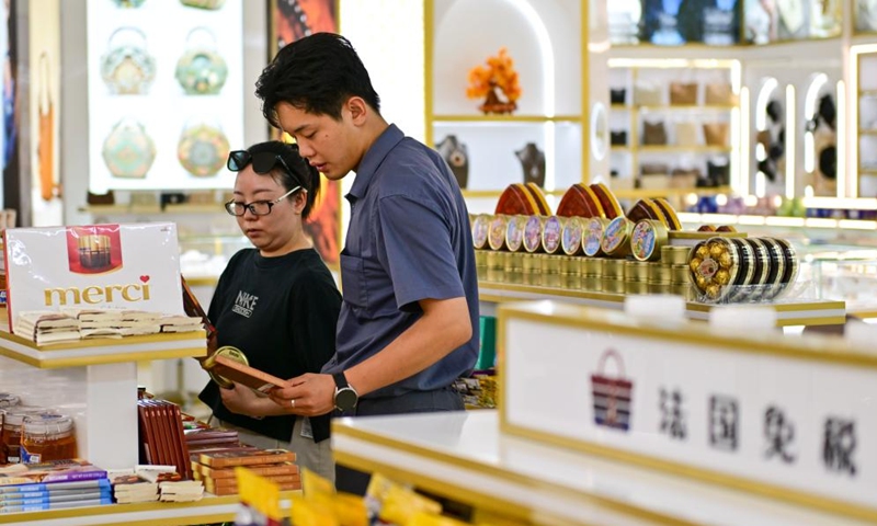 Tourists visit a duty-free shop at the Horgos International Border Cooperation Center on the China-Kazakhstan border in Horgos, northwest China's Xinjiang Uygur Autonomous Region, July 26, 2024. Since the implementation of mutual visa exemption between Kazakhstan and China in November 2023, Horgos Port has witnessed a substantial increase of entry and exit tourist trips. In recent days, the Horgos International Border Cooperation Center on the China-Kazakhstan border has ushered in the peak of border tourism. Photo: Xinhua