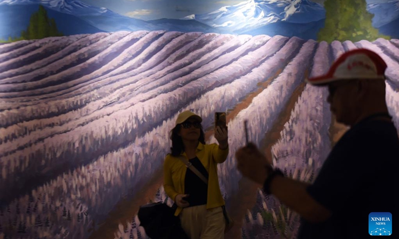 Tourists visit a lavender museum in Huocheng County, northwest China's Xinjiang Uygur Autonomous Region, July 26, 2024. Lavender was introduced in Huocheng County more than half century ago from France. Sharing many similarities with Provence in France as latitude, meteorological and soil conditions, Huocheng become the largest lavender production base in China and the third largest in the world, following Provence and Japan's Furano. In recent years, the county has given impetus to the lavender industry by integrating agriculture, industry and tourism, increasing the income of local people. Photo: Xinhua