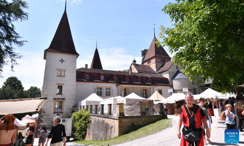 People attend the folk festival Mittelalter-Spektakel at Munchenwiler Castle in the Lake Murten region in Switzerland, July 27, 2024. The folk festival was held from Friday to Sunday at Munchenwiler Castle. Various activities, fairs, and folk performances featuring the Middle Ages were organized during the festival. Photo: Xinhua