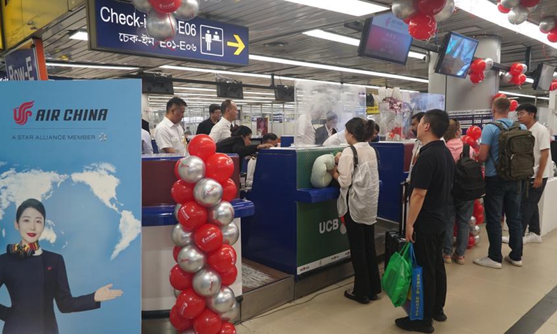 Passengers taking the inaugural Air China Dhaka-Beijing direct flight check in at Hazrat Shahjalal International Airport in Dhaka, Bangladesh, July 10, 2024. Photo: Xinhua