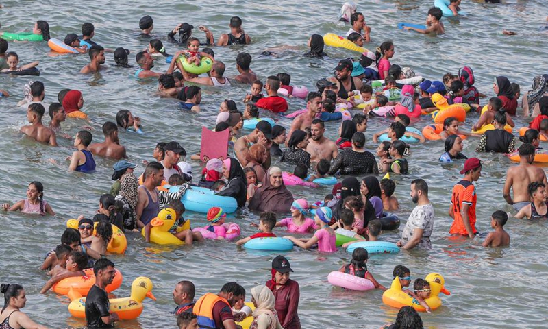 People cool off at a beach of the Mediterranean Sea during a heatwave in Alexandria, Egypt, on July 23, 2024. Photo: Xinhua