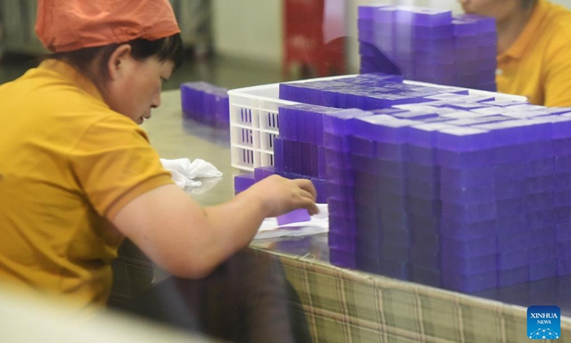 Workers make lavender soaps at a lavender museum in Huocheng County, northwest China's Xinjiang Uygur Autonomous Region, July 26, 2024. Lavender was introduced in Huocheng County more than half century ago from France. Sharing many similarities with Provence in France as latitude, meteorological and soil conditions, Huocheng become the largest lavender production base in China and the third largest in the world, following Provence and Japan's Furano. Photo: Xinhua