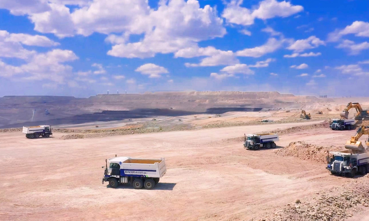 Unmanned mining trucks operate in an open pit coal mine operated by Tianchi Energy, a subsidiary of Chinese large-scale energy equipment manufacturer TBEA, in Jimsar, Changji Hui Autonomous Prefecture, Xinjiang. Photos: Courtesy
of EACON