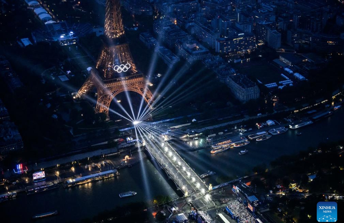 This photo taken from an helicopter on July 26, 2024 shows an aerial view of the Eiffel Tower and the Olympics Rings lightened up during the opening ceremony of the Paris 2024 Olympic Games in Paris, France. Photo: Xinhua