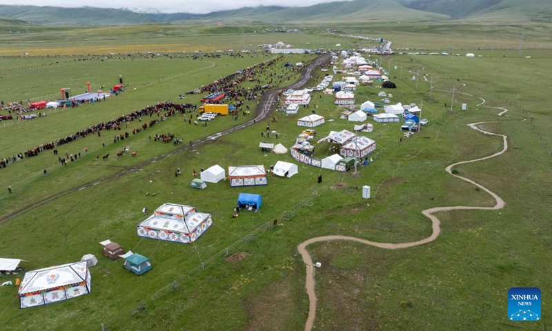 This photo taken on July 27, 2024 shows a grassland in Baiyu County, Garze Tibetan Autonomous Prefecture, southwest China's Sichuan Province. A rural folk event kicked off here on Saturday, consisting of performances, milking competition, yak beauty contest, horse racing and other activities. Photo: Xinhua