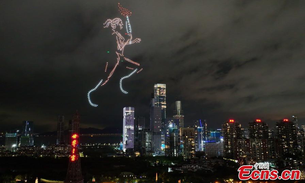 A drone show themed on Paris Olympics is staged over night sky in Shenzhen, south China's Guangdong Province, July 28, 2024. Photo: China News Service