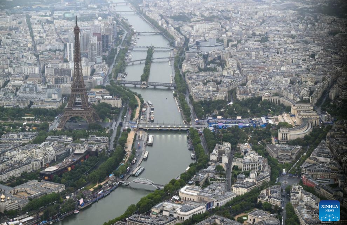 This photo taken from an helicopter on July 26, 2024 shows an aerial view of the Eiffel Tower along the Seine river during the opening ceremony of the Paris 2024 Olympic Games in Paris, France. Photo: Xinhua