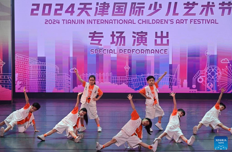 Children from the Macao Children Arts Troupe perform during the 2024 Tianjin International Children's Art Festival, in north China's Tianjin, July 23, 2024. Photo: Xinhua