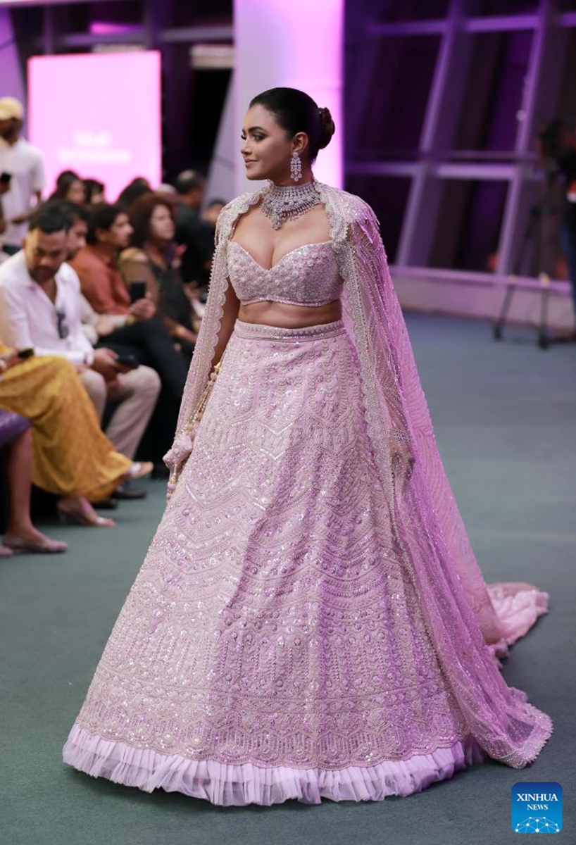 A model presents a bridal creation at the Designer Wedding Show 2024 at Lotus Tower in Colombo, Sri Lanka, on July 28, 2024. Photo: Xinhua