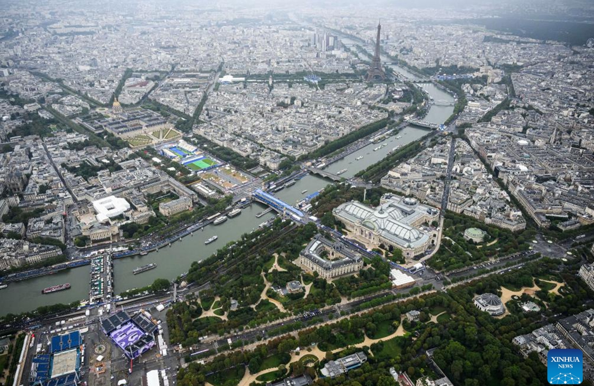 This photo taken from an helicopter on July 26, 2024 shows an aerial view of the Eiffel Tower (rear C) and the Grand Palais (front R) during the opening ceremony of the Paris 2024 Olympic Games in Paris, France. Photo: Xinhua