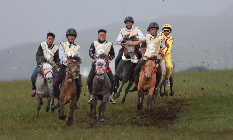 Riders participate in a horse racing on a grassland in Baiyu County, Garze Tibetan Autonomous Prefecture, southwest China's Sichuan Province, July 27, 2024. Photo: Xinhua