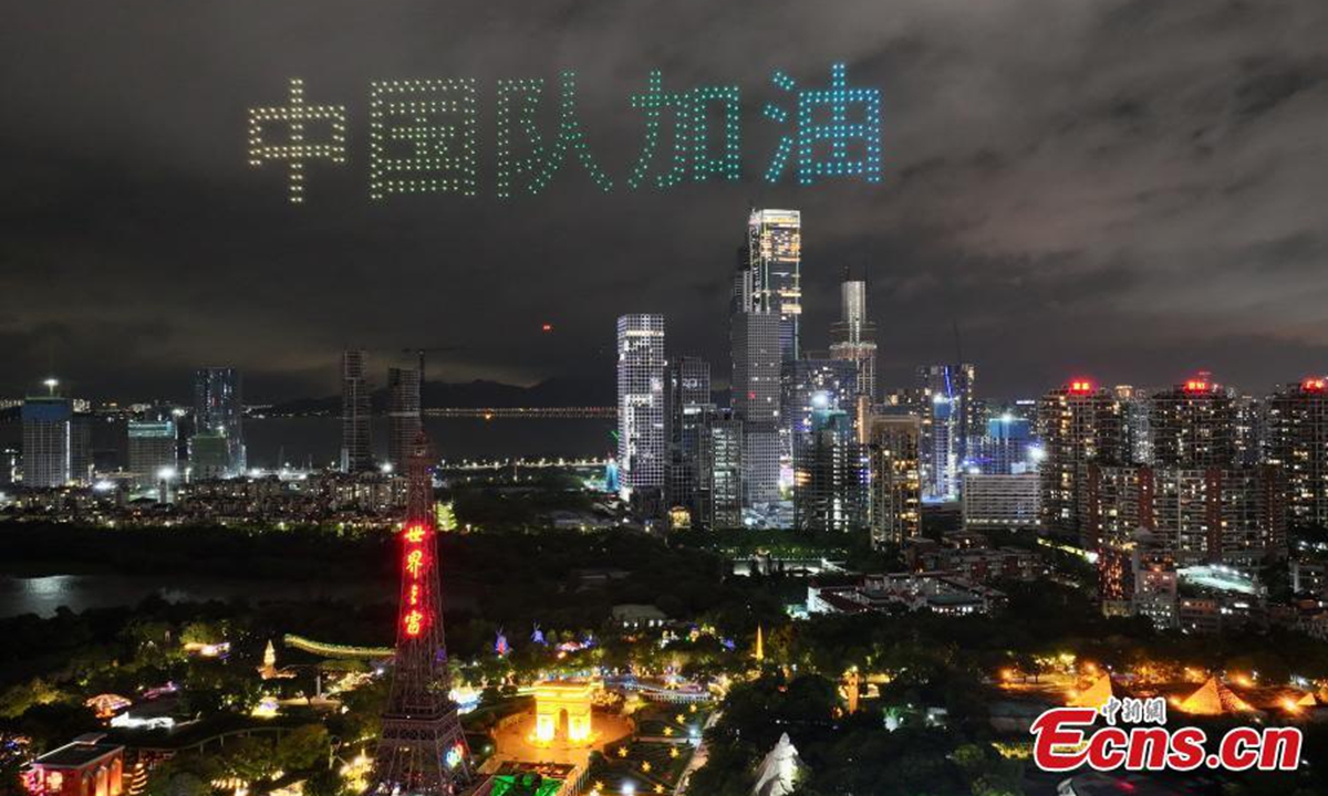 A drone show themed on Paris Olympics is staged over night sky in Shenzhen, south China's Guangdong Province, July 28, 2024. Photo: China News Service