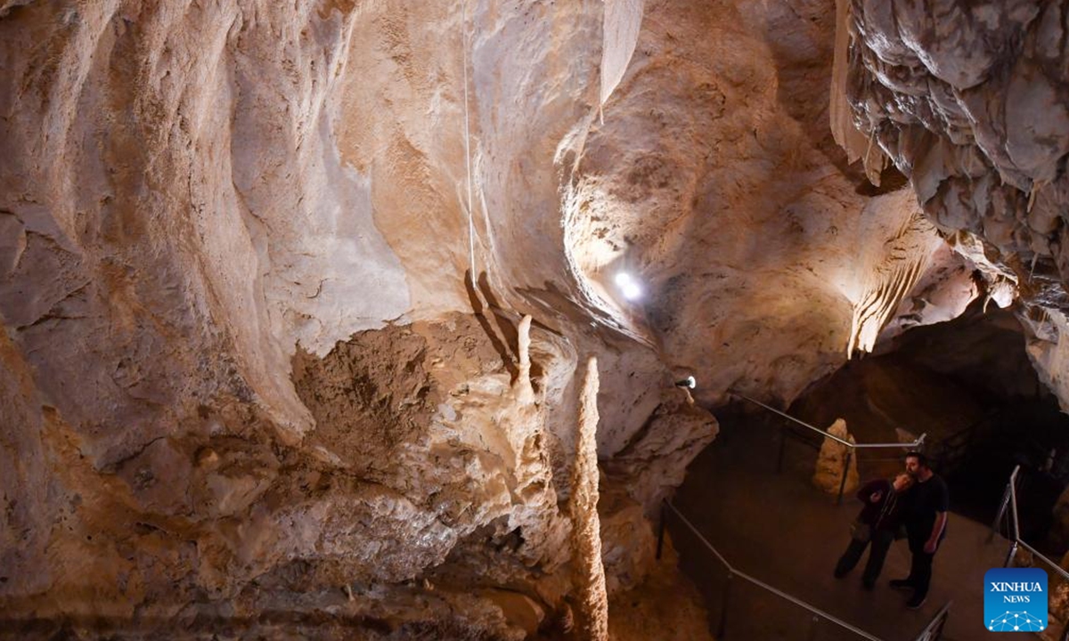 People visit the Vallorbe Caves in Switzerland, July 28, 2024. Nestled in the heart of the Jura Mountains in Switzerland, the Vallorbe Caves are well-known for the magnificent limestone caves formed over thousands of years. (Photo: Xinhua)