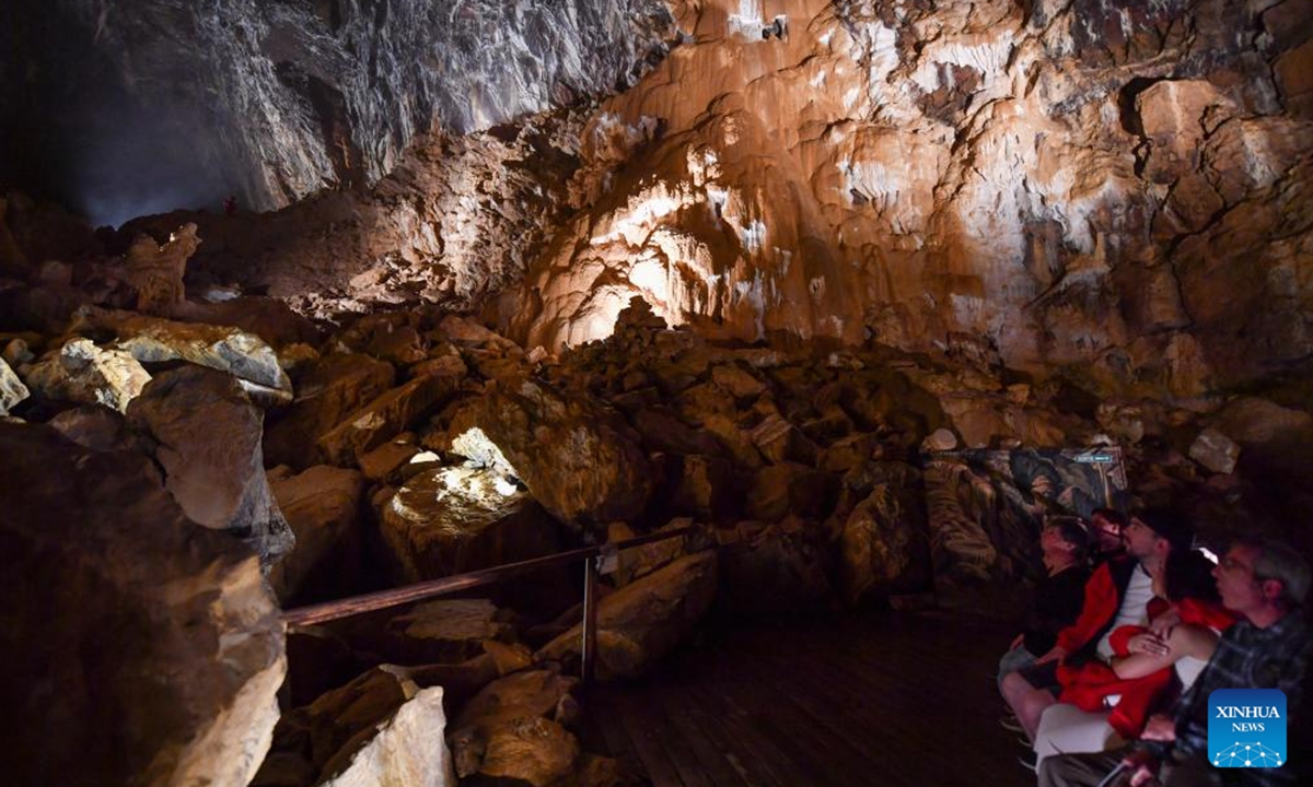 People visit the Vallorbe Caves in Switzerland, July 28, 2024. Nestled in the heart of the Jura Mountains in Switzerland, the Vallorbe Caves are well-known for the magnificent limestone caves formed over thousands of years. (Photo: Xinhua)