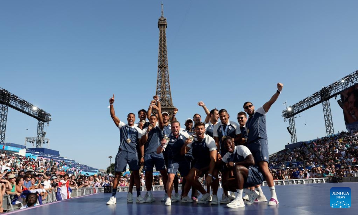 Medalists of France pose for photos at Champions Park for the Paris 2024 Olympic Games in Paris, France, July 29, 2024. (Photo: Xinhua)