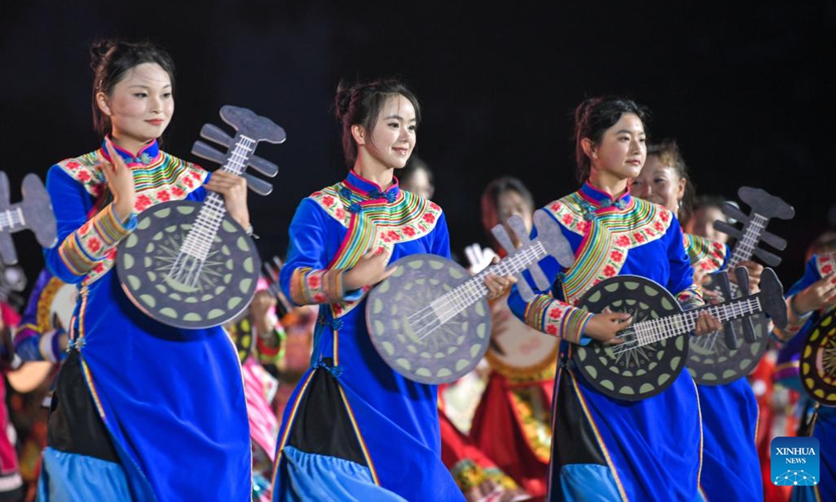 Actors perform traditional dance during the annual Torch Festival of Yi ethnic group held in Weining County, southwest China's Guizhou Province, July 29, 2024. (Photo: Xinhua)