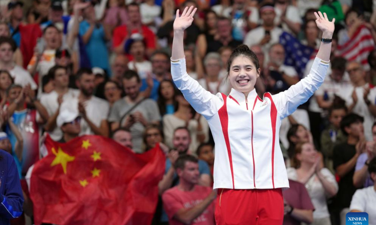 Bronze medalist Zhang Yufei of China reacts during the victory ceremony for the women's 100m butterfly of swimming at the Paris 2024 Olympic Games in Paris, France, July 28, 2024. Photo:Xinhua