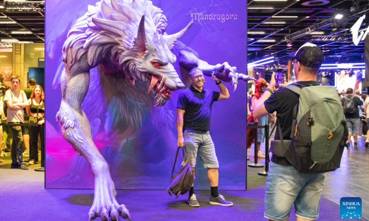 A man poses for photos during Gamescom 2024 in Cologne, Germany, Aug 21, 2024. Gamescom 2024 kicked off here on Wednesday, attracting more than 1,400 exhibitors from 64 countries and regions. Photo:Xinhua