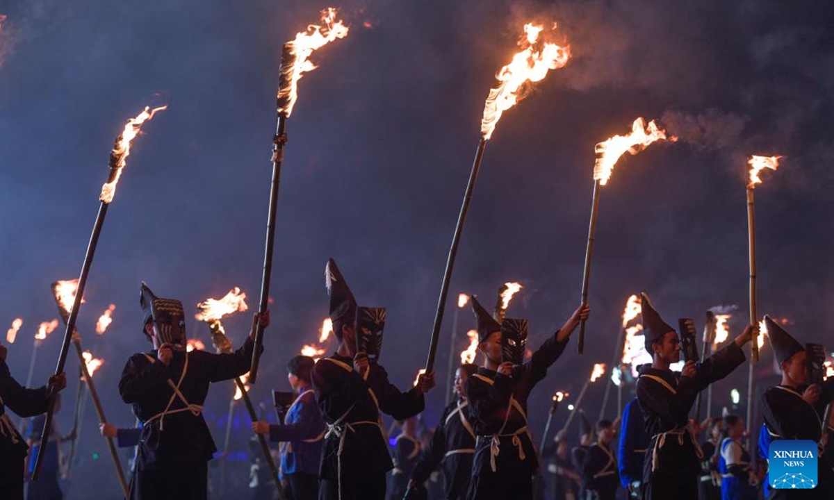 Actors perform during the annual Torch Festival of Yi ethnic group held in Weining County, southwest China's Guizhou Province, July 29, 2024. (Photo: Xinhua)