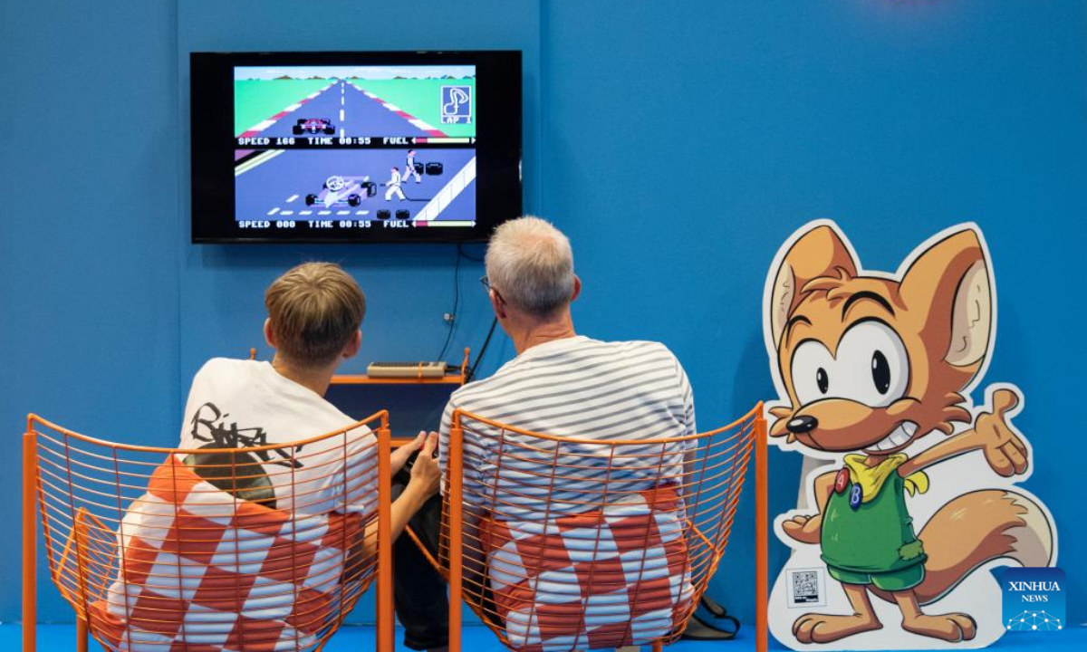 People try a game during Gamescom 2024 in Cologne, Germany, Aug 21, 2024. Gamescom 2024 kicked off here on Wednesday, attracting more than 1,400 exhibitors from 64 countries and regions. Photo:Xinhua