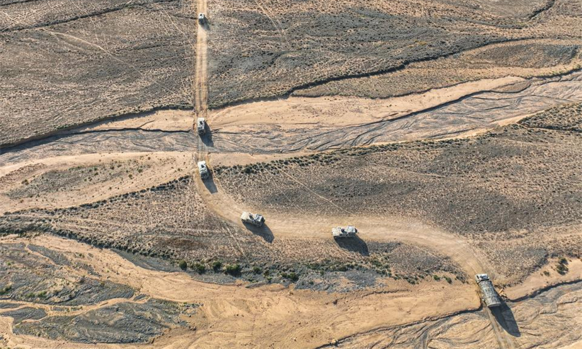 Military vehicles attached to a regiment under the PLA Xinjiang Theater Command are en route to a designated area during a driving training exercise on July 30, 2024. Photo:China Military