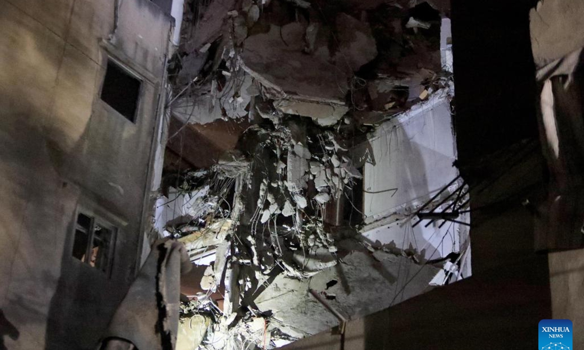 A building is seen destroyed after being struck in an Israeli attack in the southern suburb of Beirut, Lebanon, on July 30, 2024. Israel's army announced on Tuesday that it killed Hezbollah's top military commander, Fouad Shokor, in an airstrike in Beirut, saying the assassination was a retaliation for a cross-border rocket that killed 12 youngsters on Saturday. (Photo: Xinhua)