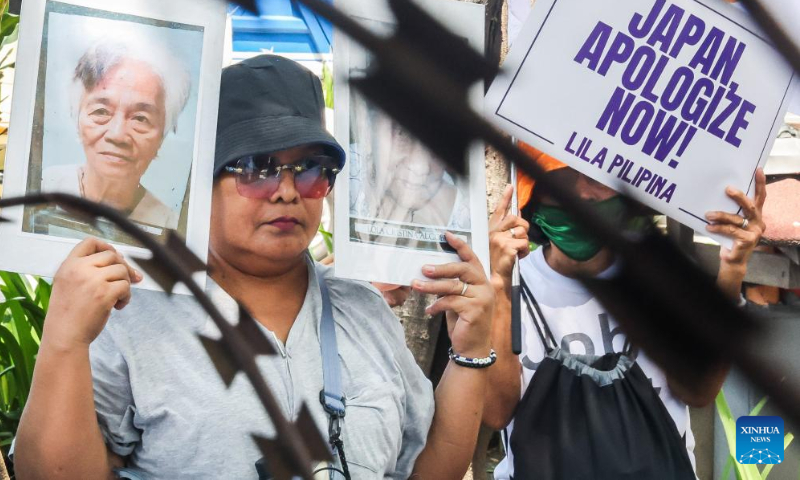 People participate in a demonstration fighting for justice for Philippine wartime sexual slavery victims of the Japanese troops during World War II in Manila, the Philippines, on Aug. 14, 2024. (Photo: Xinhua)