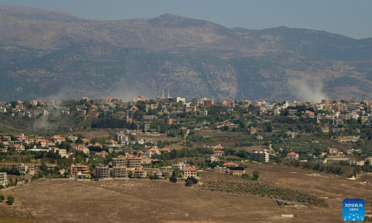 Smoke billows following Israeli artillery shelling in Lebanese town of Khiam, as seen from Marjeyoun, Lebanon, on Aug 22, 2024. Israeli warplanes and drones carried out 12 airstrikes on 10 Lebanese border towns and villages during the dawn and morning hours, according to Lebanese military sources. Photo:Xinhua