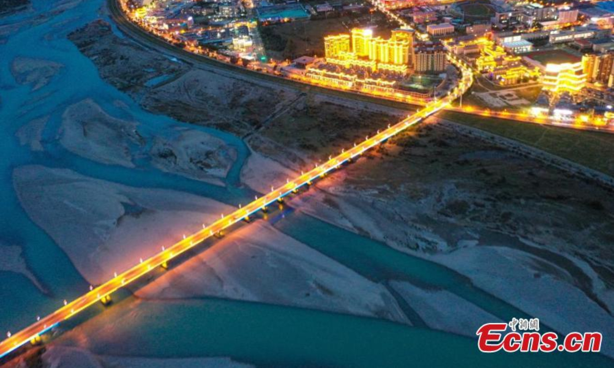 Lights illuminate Nyingchi City along the Nyang River, creating a picturesque night scenery in southwest China's Xizang Autonomous Region, Aug 22, 2024. Photo:Xinhua