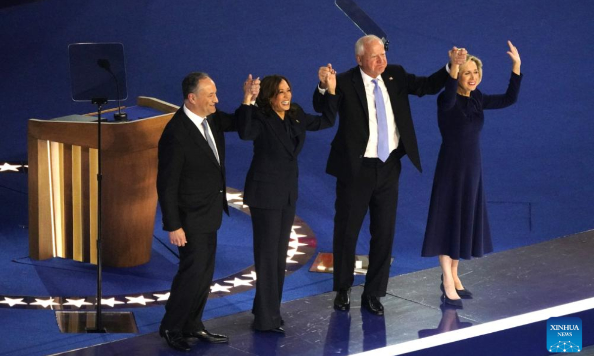 US Vice President Kamala Harris (2nd L) greets the audience at the Democratic National Convention in Chicago, the United States, Aug 22, 2024. US Vice President Kamala Harris officially accepted the Democratic Party's presidential nomination at the Democratic National Convention (DNC) held at the United Center in Chicago on Thursday night.Photo:Xinhua