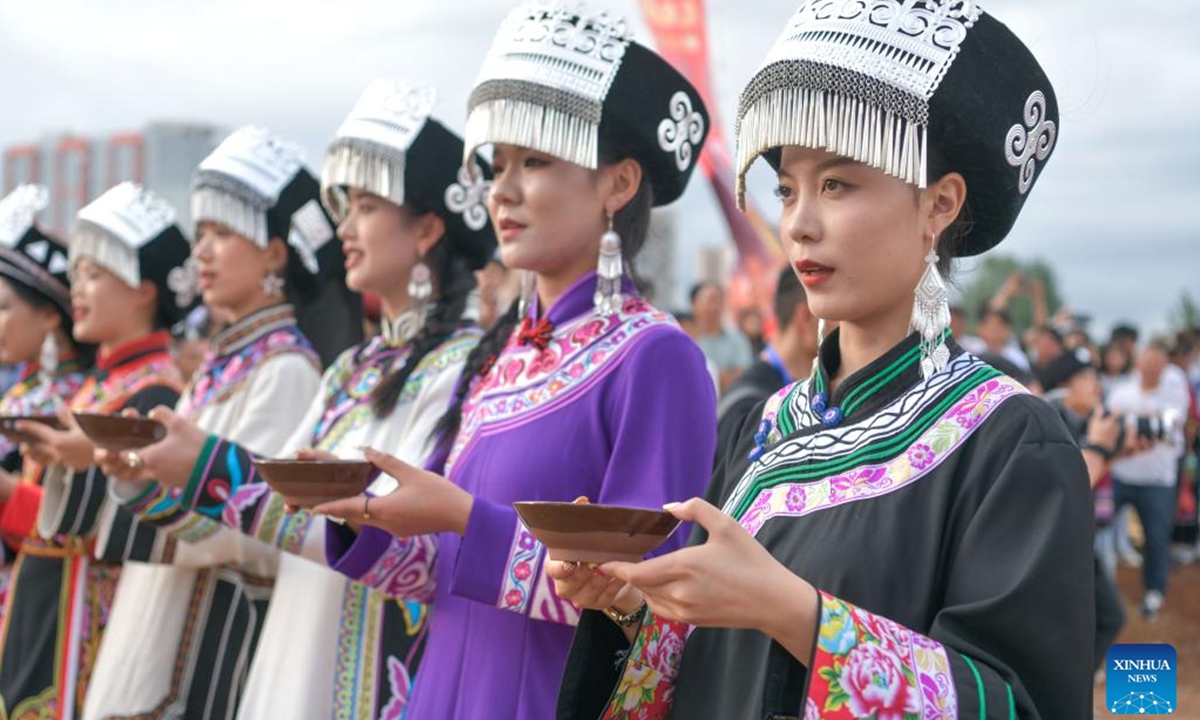 Women in traditional costumes take part in the annual Torch Festival of Yi ethnic group held in Weining County, southwest China's Guizhou Province, July 29, 2024. (Photo: Xinhua)