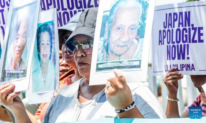 People participate in a demonstration fighting for justice for Philippine wartime sexual slavery victims of the Japanese troops during World War II in Manila, the Philippines, on Aug. 14, 2024. (Photo: Xinhua)