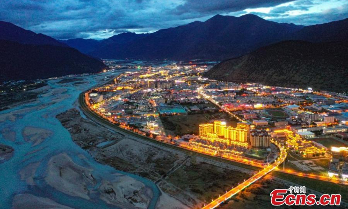 Lights illuminate Nyingchi City along the Nyang River, creating a picturesque night scenery in southwest China's Xizang Autonomous Region, Aug 22, 2024. Photo:Xinhua