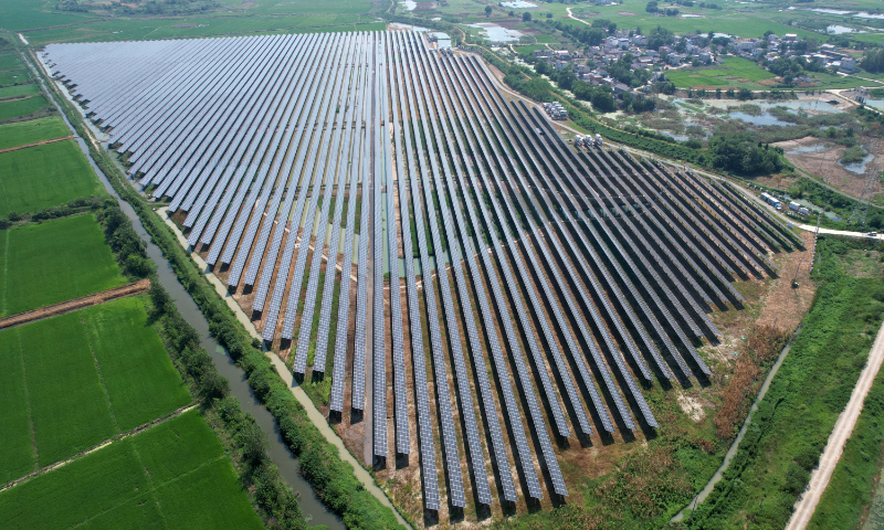 Photo taken on August 9, 2024 shows an agricultural complementary photovoltaic (PV) power station in Guosheng village, East China's Anhui Province. In recent years, Guosheng has been adhering to green development, combining PV power stations with agriculture, allowing clean electricity generation and farming to take place simultaneously. Photo: VCG